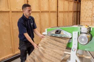 Wrapped furniture and cartons stacked in Move It's secure storage